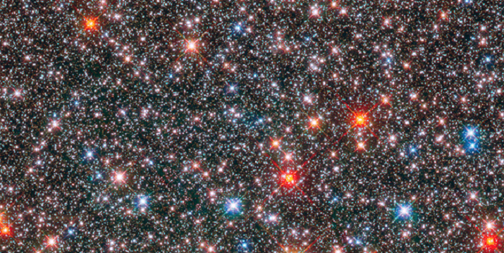 this-hubble-space-telescope-image-of-a-sparkling-jewel-box-full-of-stars-captures-the-heart-of-our-m.png